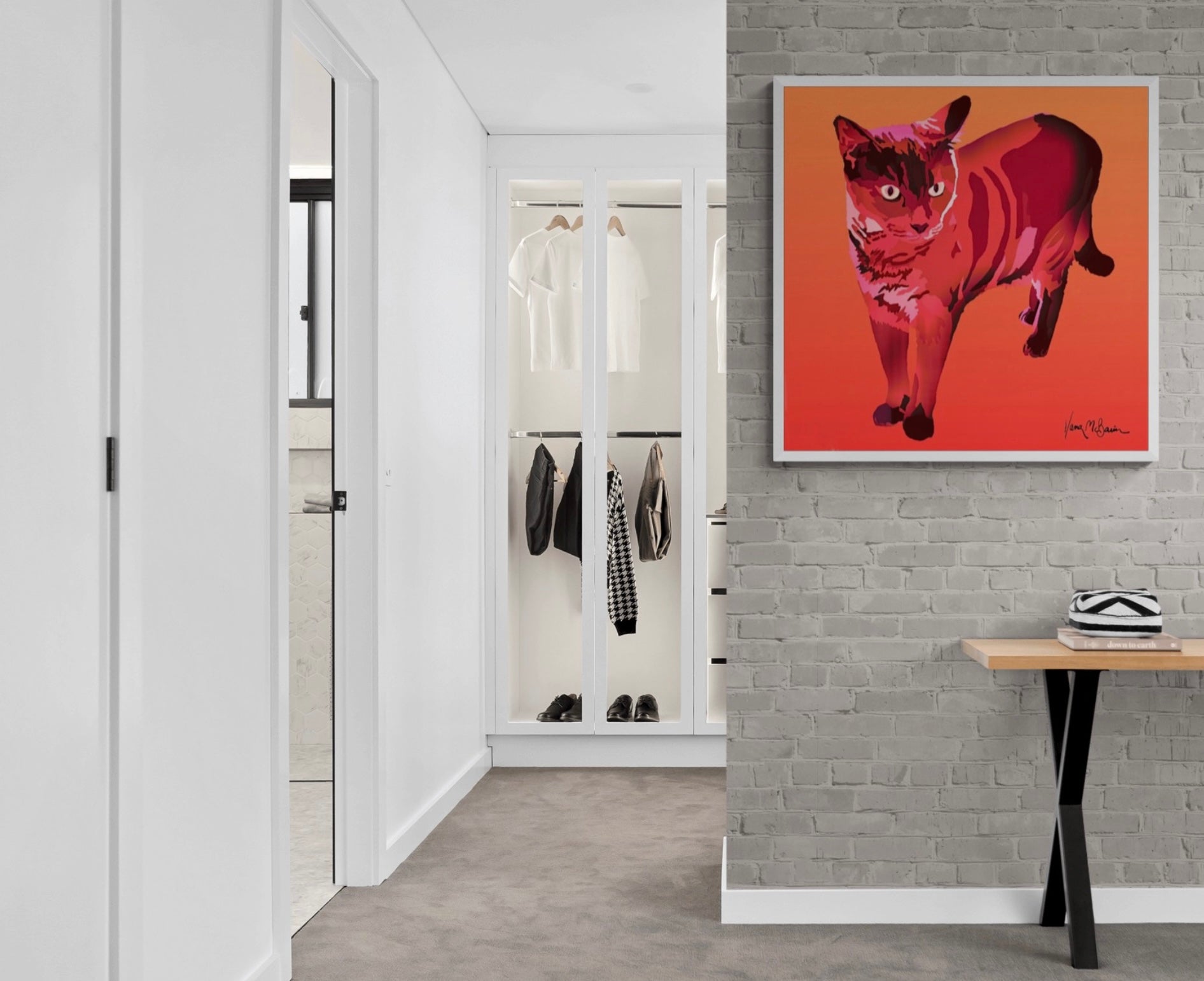 A contemporary pop art portrait of a Siamese cat, adding a vibrant splash of warm red and orange shades to the clean decor of a bedroom entryway.